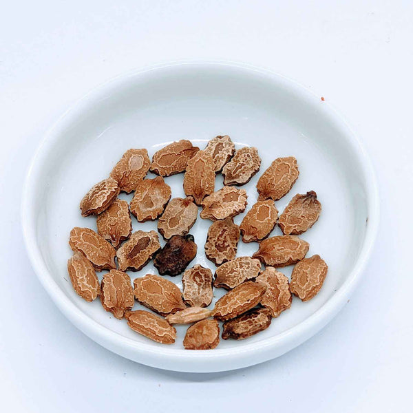 Bitter gourd seeds in a bowl