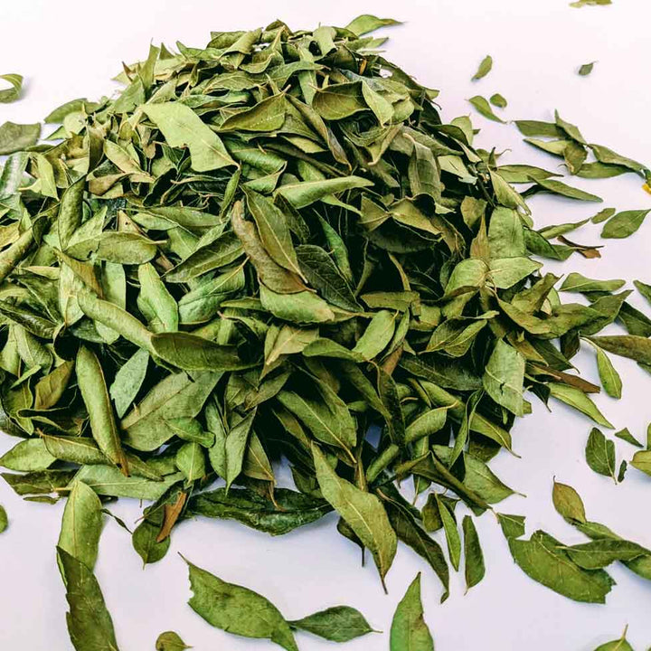 Curry Leaves,Murraya Koenigii Leaves,Curry Leaves: Aromatic & Flavorful,Dried Curry Leaves: Whole or Crushed,Curry Leaf Curry,Organic Curry Leaves Bunch for Cooking,Curry Leaf Plant with Healthy Green Leaves,Healthy Curry Leaves Growing on a Branch,spices,organic curry leaves,NON GMO.