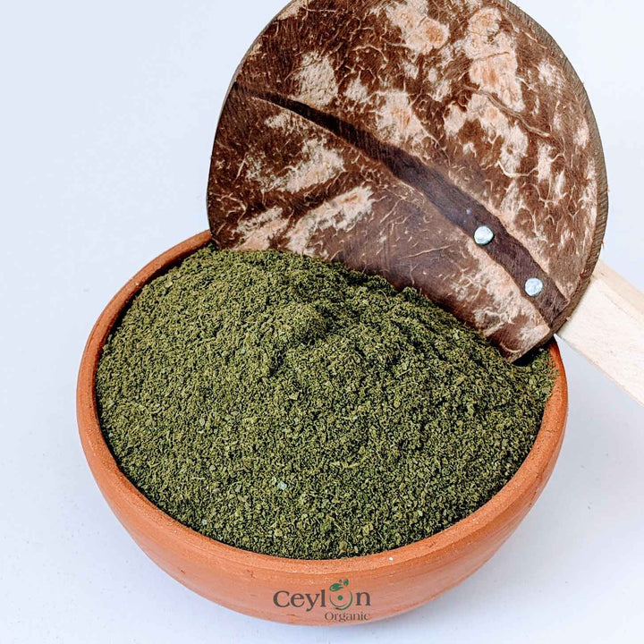 dried curry leaves powder is availableable in a cup to flavor food