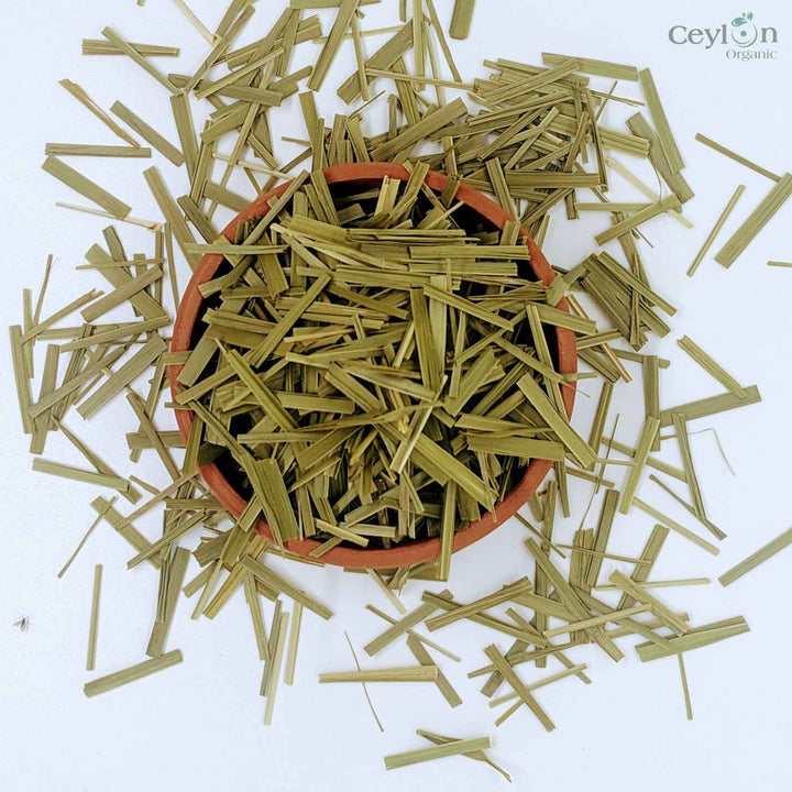 A steaming cup of lemongrass tea, gently releasing its soothing aroma and promising a calming blend of health benefits, from aiding digestion to boosting immunity.