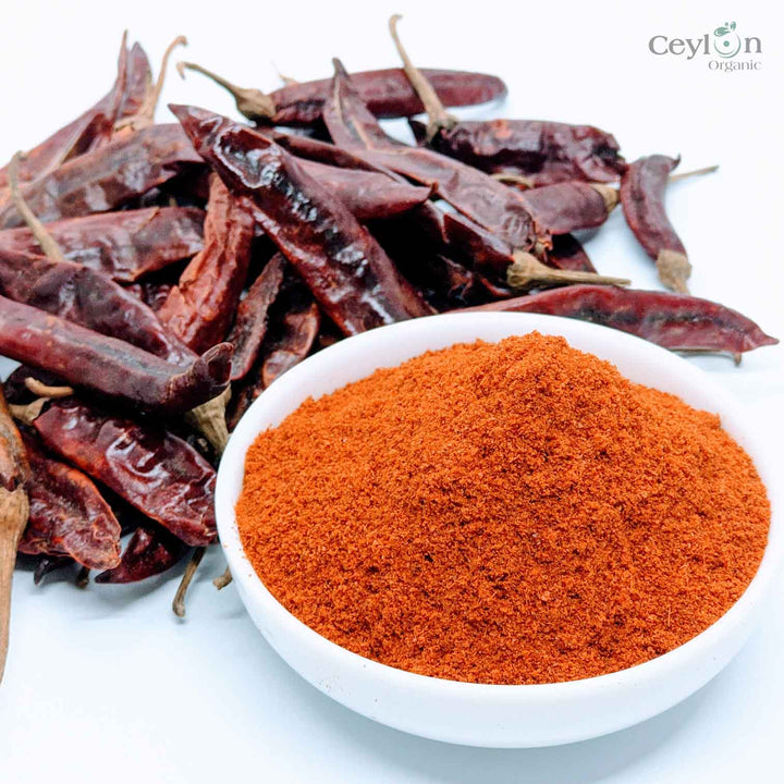 A vibrant red powder made from dried and ground chili peppers. It is a staple ingredient in many cuisines around the world, and adds a bold, spicy flavor to dishes.