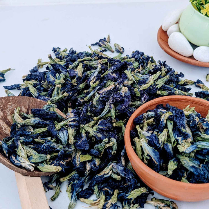 A steaming cup of butterfly tea made from organically grown butterfly pea flowers.